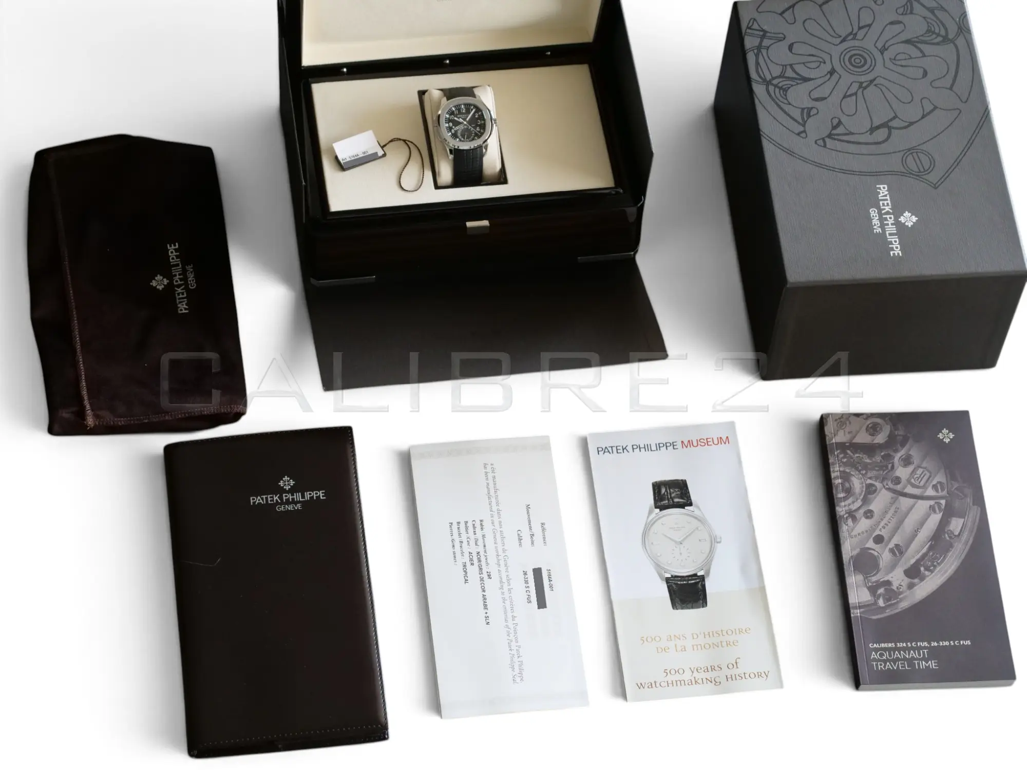 Patek Philippe Aquanaut Travel Time 5164A-001 2022 full set box papers serial hang tag Calibre24 Perth Australia