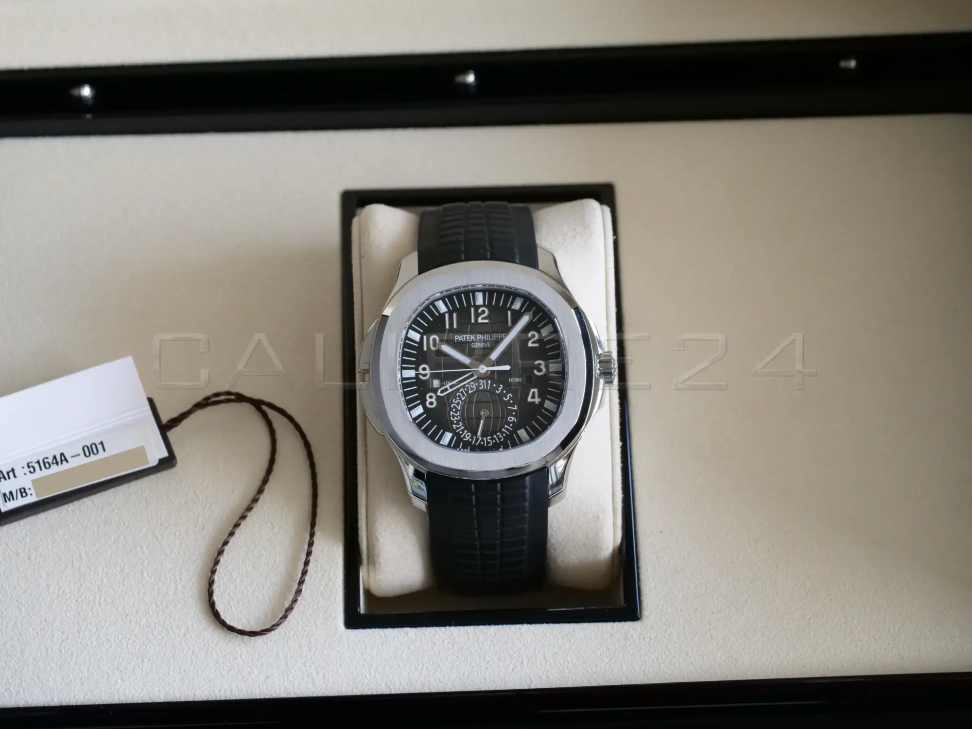 Patek Philippe Aquanaut Travel Time 5164A-001 2022 full set box papers serial hang tag Calibre24 Perth Australia
