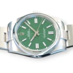 Rolex Oyster Perpetual 41 124300 Green Dial 2024 full set with box and papers available at Calibre24 Luxury Watches Perth Australia