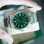 Rolex Oyster Perpetual 41 124300 Green Dial 2024 full set with box and papers available at Calibre24 Luxury Watches Perth Australia