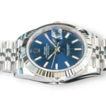 Rolex 126334-0002 blue sunray dial white gold index markers Chromalight hands Cyclops date close-up