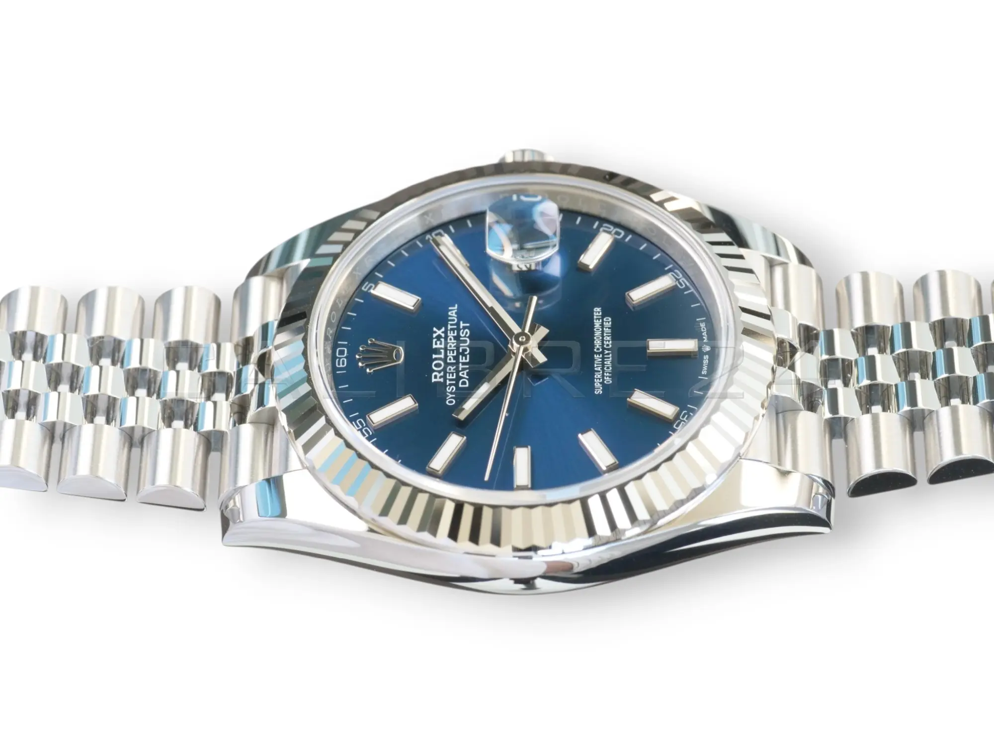 Rolex 126334-0002 blue sunray dial white gold index markers Chromalight hands Cyclops date close-up