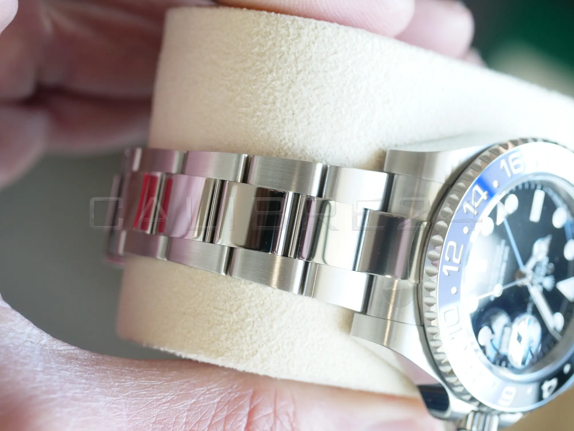 Rolex GMT-Master II Batman black blue Cerachrom bezel platinum numerals 24-hour scale