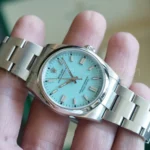 Rolex 126000-0006 turquoise lacquer dial white gold index markers Chromalight close-up