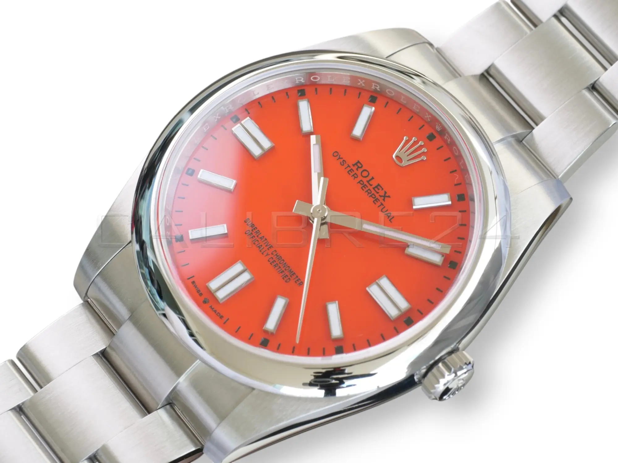 Rolex 124300-0007 coral red lacquer dial white gold baton markers Chromalight hands pristine close-up