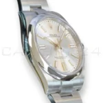 Rolex Oyster Perpetual 41 silver 124300-0001 2023 mint full set box green warranty card papers Calibre24 Pert