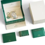 Rolex Oyster Perpetual 41 silver 124300-0001 2023 mint full set box green warranty card papers Calibre24 Pert