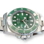 Rolex 116610LV green sunburst dial applied luminous hour markers date 3 o'clock Cyclops Hulk close-up
