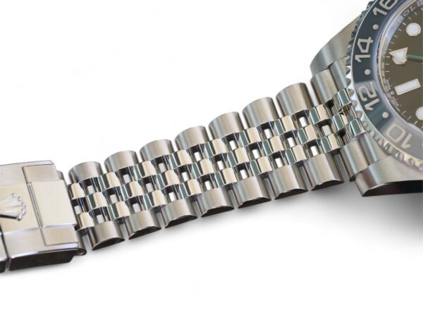 ROLEX GMT MASTER II BRUCE WAYNE GREY BEZEL GREEN GMT HAND 126710GRNR Calibre24 Luxury Watches