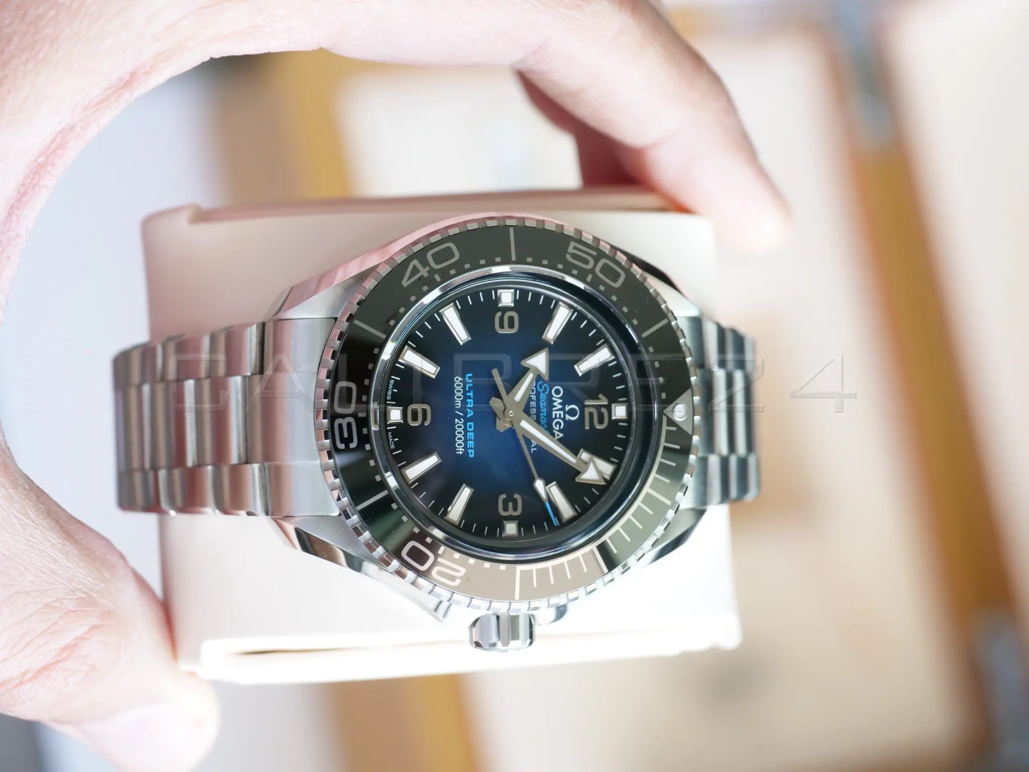 Omega Seamaster Planet Ocean 6000m Ultra Deep Brand New 2025 full set with box and papers available at Calibre24 Luxury Watches Perth Australia