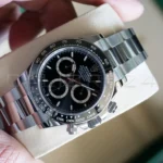 Rolex Daytona 126500LN full set — original green Rolex box, outer box, warranty card, papers, booklets and swing tags, brand new 2026
