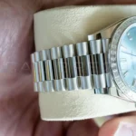 Rolex Day-Date 40 platinum President bracelet three-piece solid links ceramic inserts Crownclasp concealed