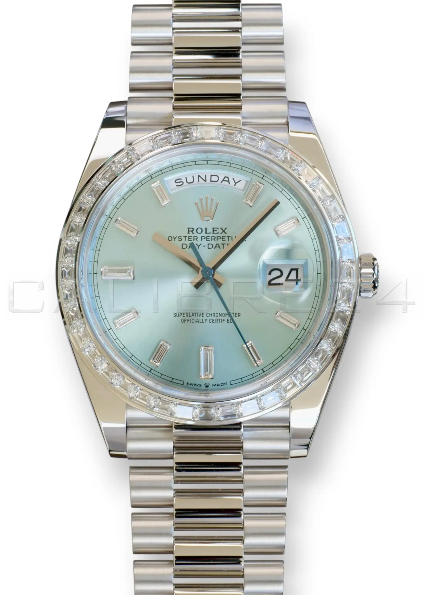 ROLEX DAY‑DATE 40 PLATINUM ICE BLUE BAGUETTE DIAL DIAMOND BEZEL 228396TBR