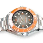 Omega Seamaster Ultra Deep 6000M 215.30.46.21.06.001 orange ceramic bezel grey black gradient dial front