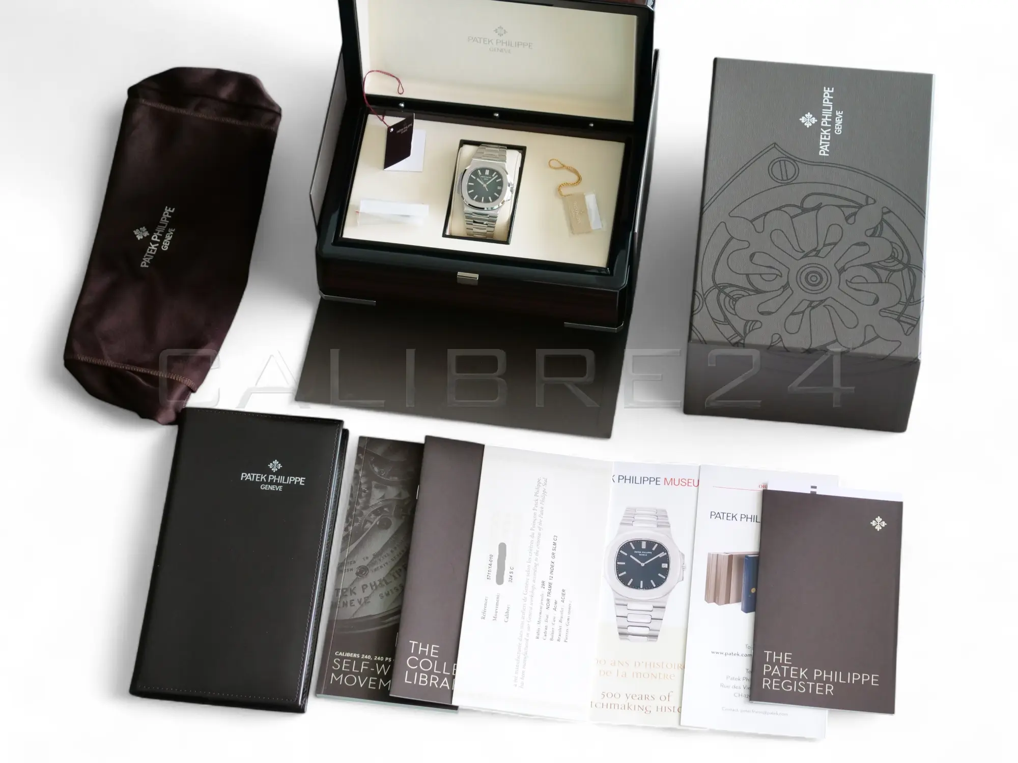 Patek Philippe Nautilus 5711/1A-010 2017 full set presentation box papers white serial hang tag Patek service card Calibre24 Perth