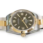 Rolex Explorer 36 124273 two-tone Rolesor Oystersteel yellow gold black dial Oyster bracelet front view NOS 2024