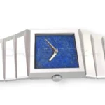 Toledano & Chan B/1 brutalist asymmetric 904L steel case — side profile showing faceted planes and left-side crown