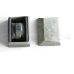 Toledano & Chan B/1 original concrete presentation box with minor storage damage — watch unaffected, as describe