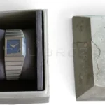 Toledano & Chan B/1 original concrete presentation box with minor storage damage — watch unaffected, as describe