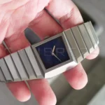Toledano & Chan B/1 original concrete presentation box with minor storage damage — watch unaffected, as describe